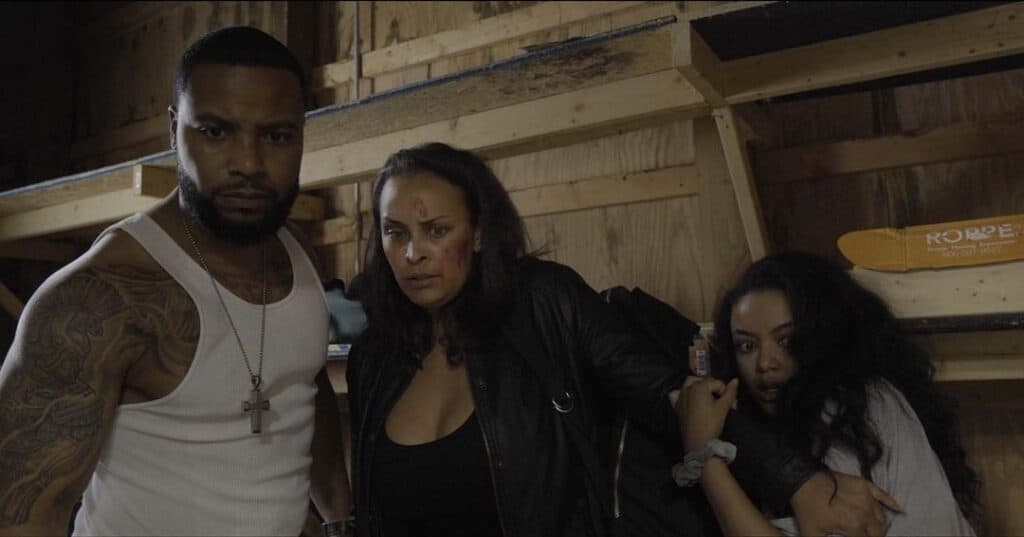 Theron Johnson on set of Kingdom Reign with 2 of his co-stars (faith)