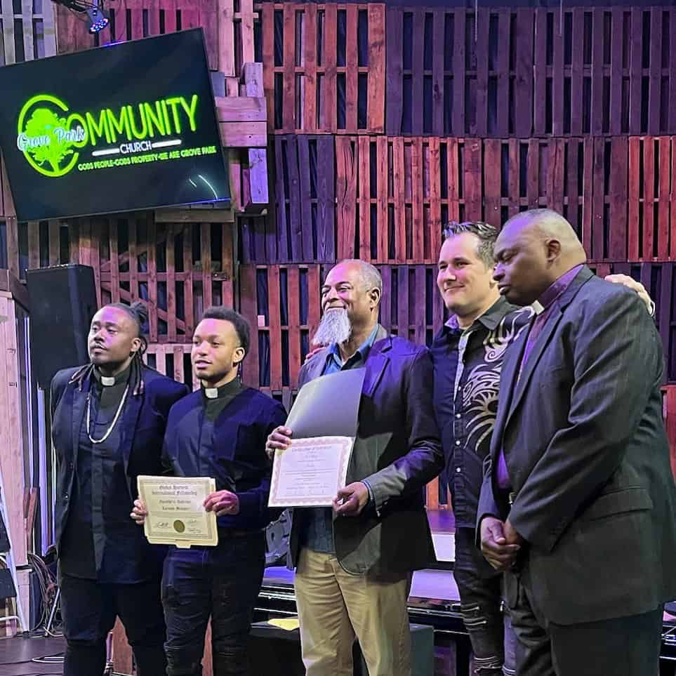 Mr. 2-17 on stage with other leaders (faith)
