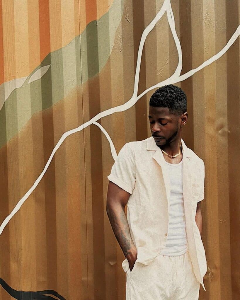 CJ King in white (In God I Flex)