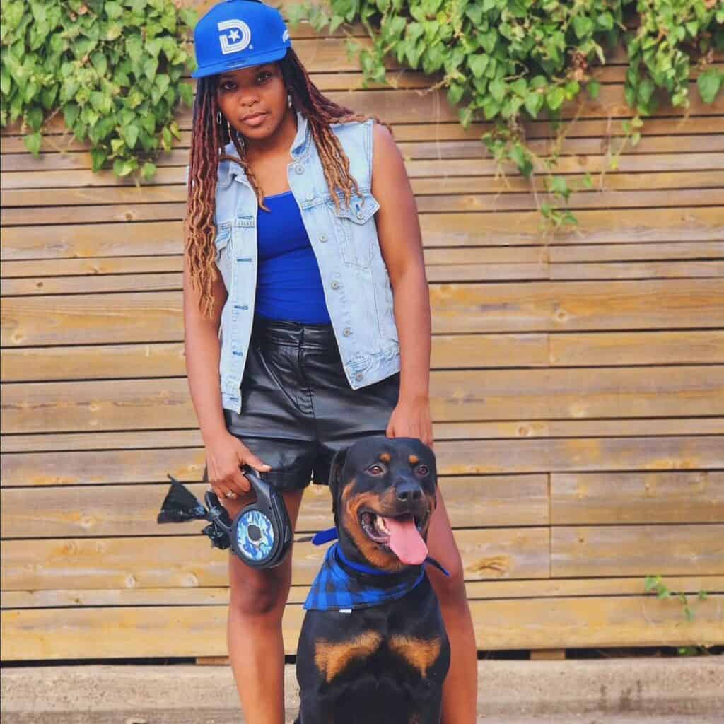 Shy Speaks Blue and Black outfit with dog (hip hop)