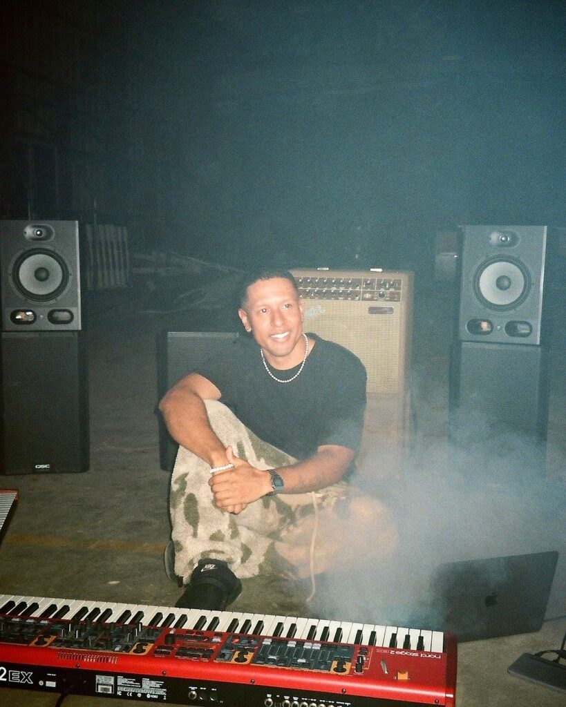 Gawvi backstage with speakers and keyboard