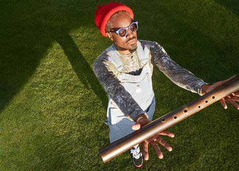 COTB 12032023 alt pic 1 Andre 3000 with flute - church 